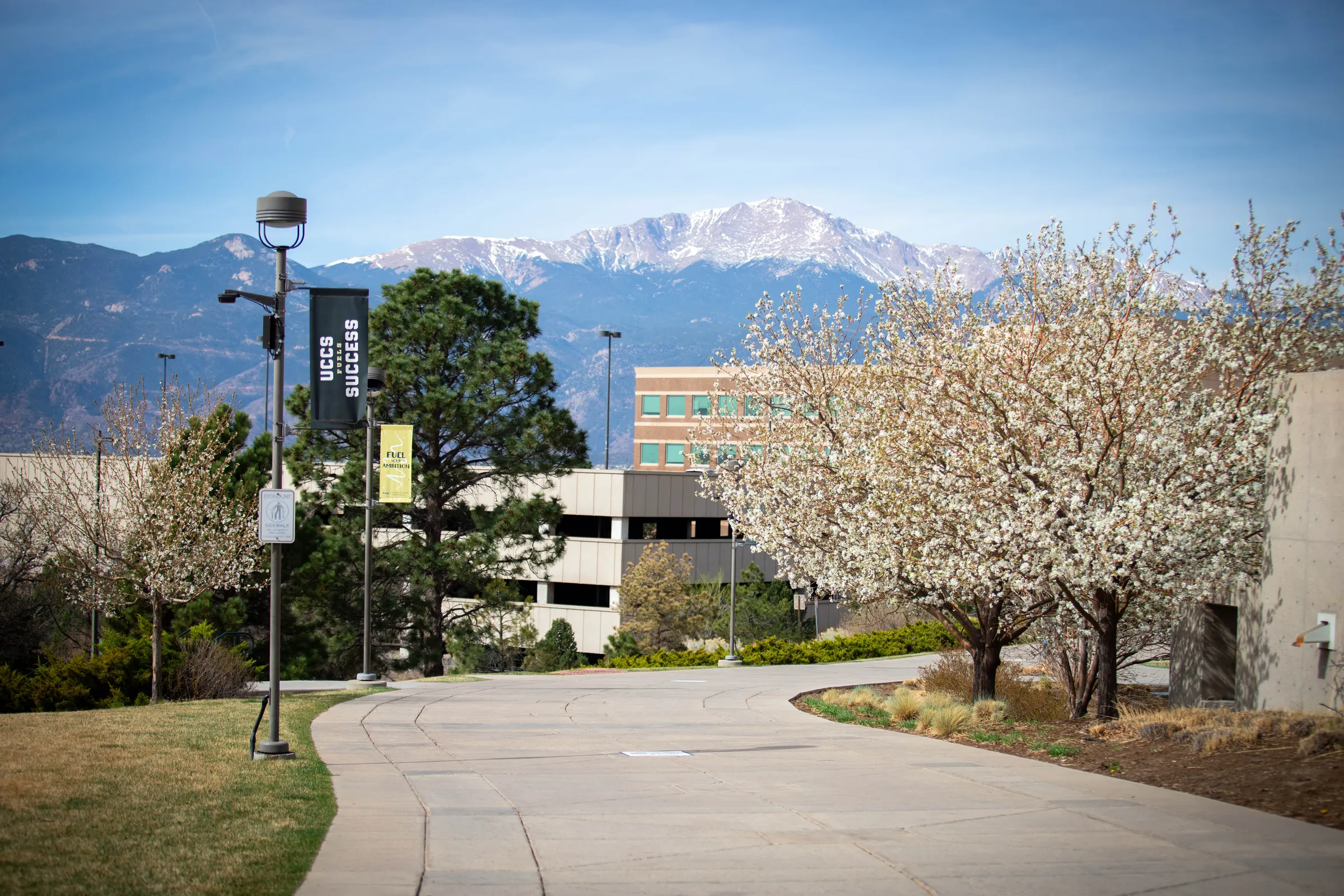 UCCS campus walkway with Pikes Peak in the distance