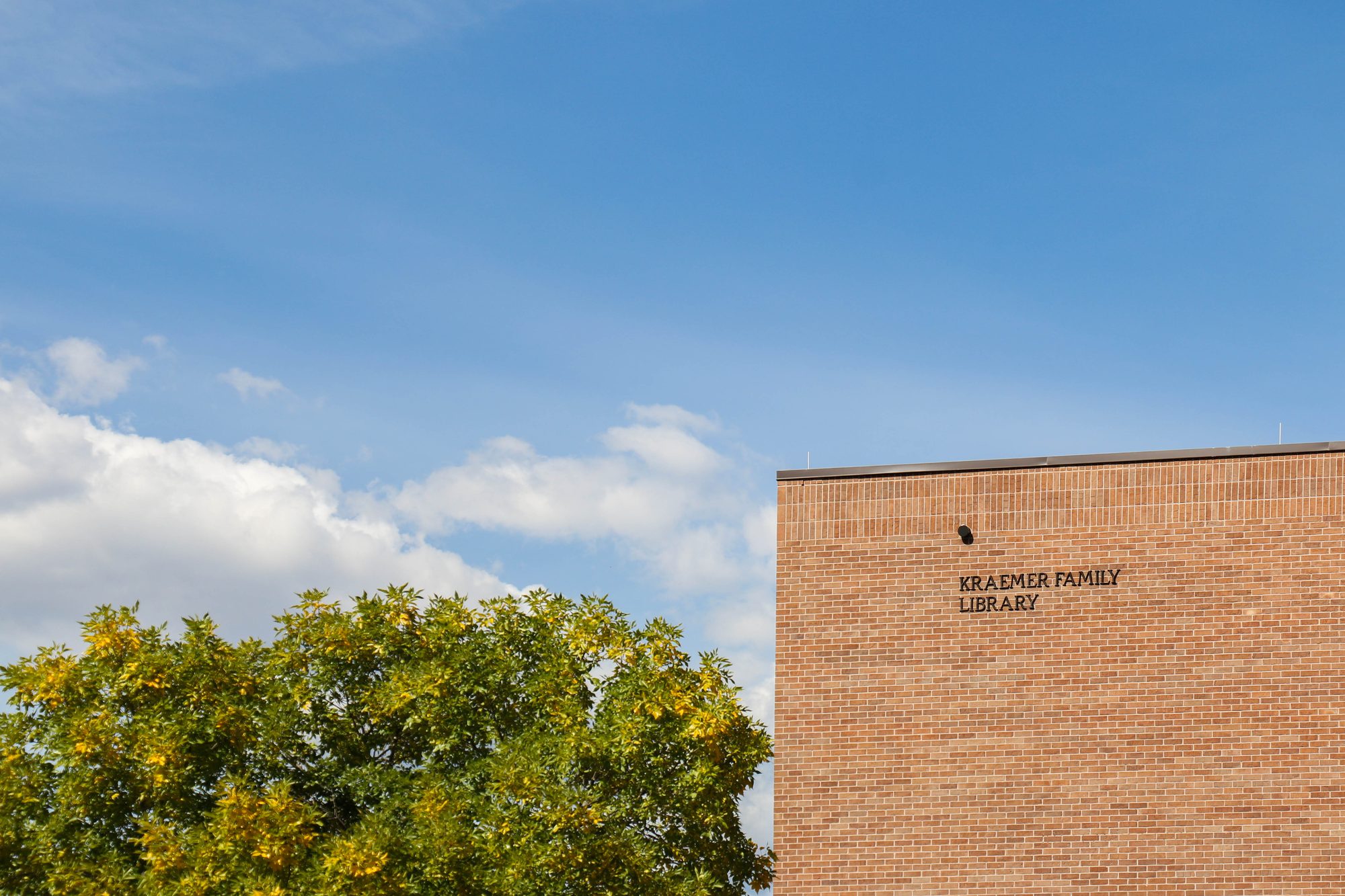 Kraemer Family Library under a blue sky