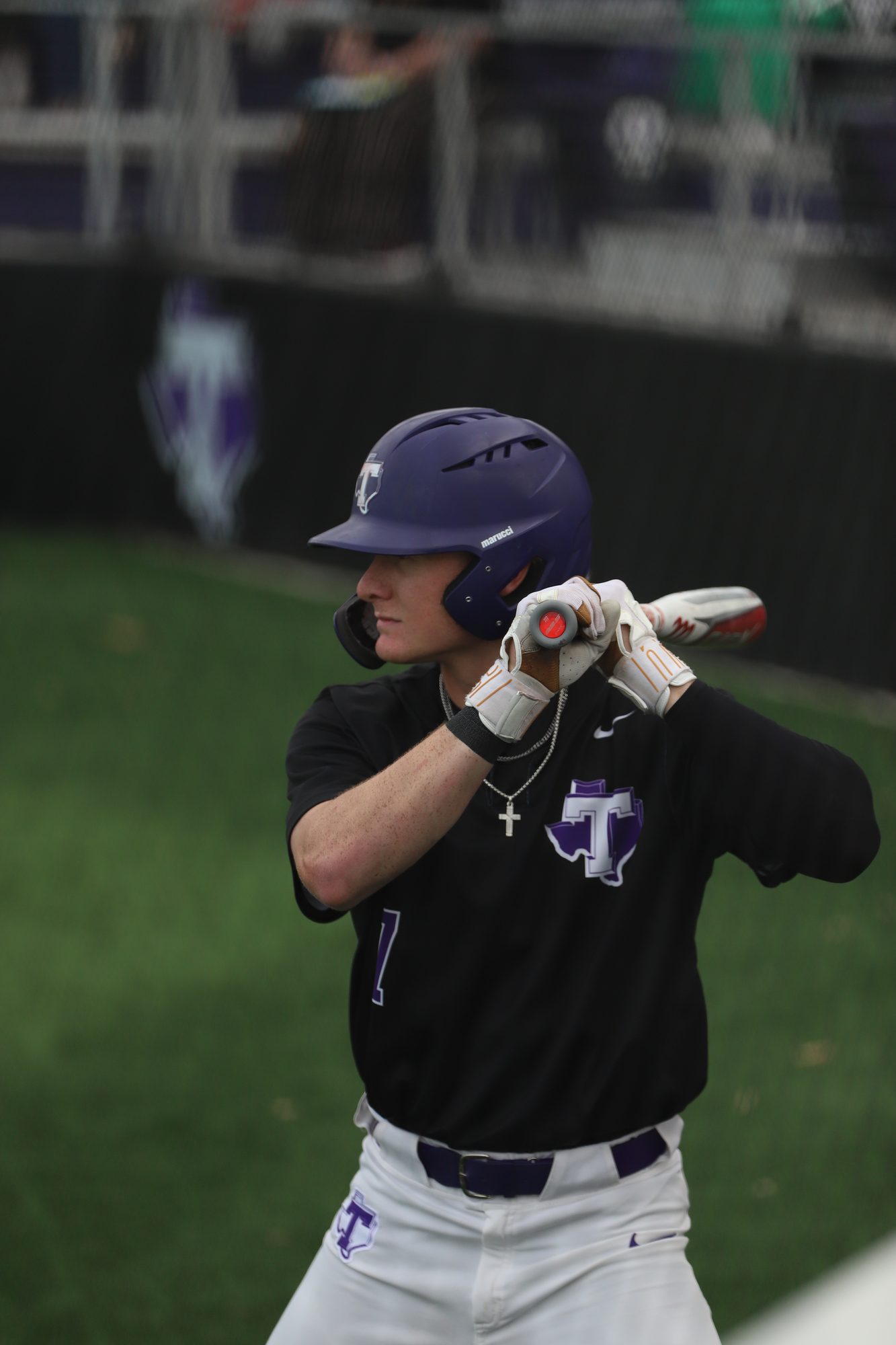 Batter gripping his bat